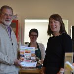 Karen McAra, Polaris Learning with Colin Stirling, Pitscurry Environmental Project with a copy of the recipe book.
